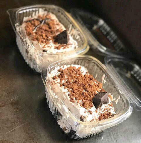 Dessert cups topped with chocolate crumble and chunks